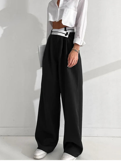 Pantalon asymétrique avec ceinture contrastée